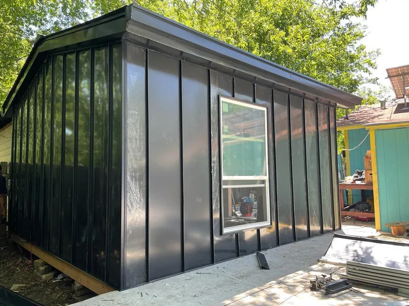 Black standing seam metal wall panels for Metal Roof Installation in Watertown